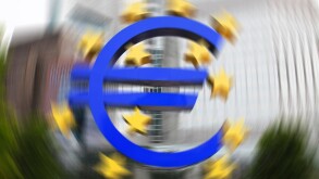 EURO crisis - European Central Bank (ECB) with the Euro sign outside in Frankfurt (Main)