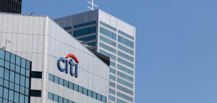 The Citi bank, Citigroup logo atop of an office building in downtown Toronto, seen on a clear and blue sky day.