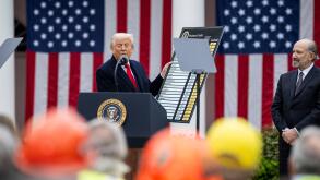 Washington, United States. 02nd Apr, 2025. U.S President Donald Trump holds a chart of global trade as he announces his tariff plan for all imported goods during his Make America Wealthy Again event at the Rose Garden of the White House, April 2, 2025 in 