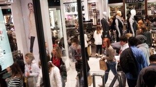 Busy shop floor at Topshop, London. This is one of the most successful mainstream retail shopping outlets in the UK.