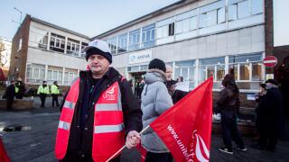 A bus Driver on strike outside Telford Avenue bus depot owned by Arriva.