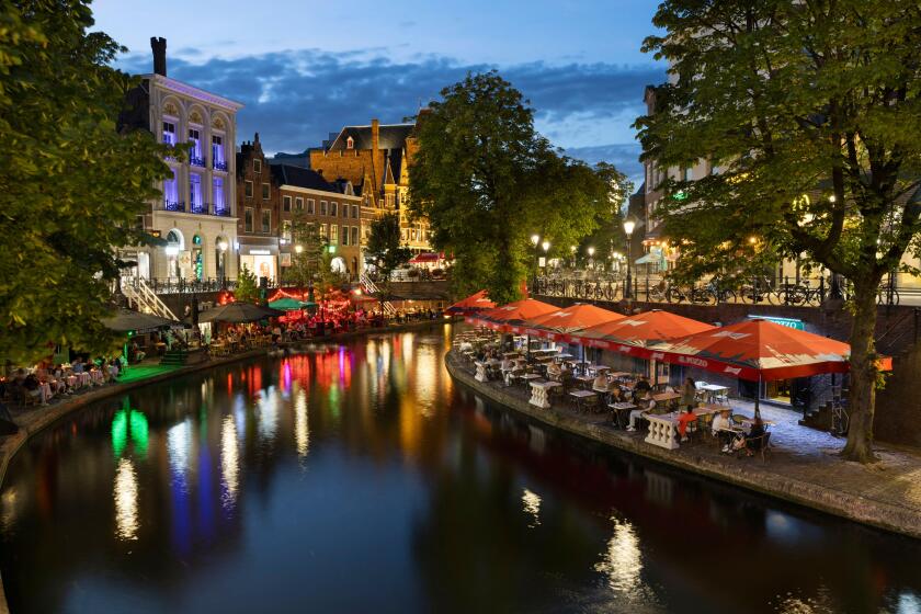 Bars and restaurants along Oudegracht canal come alive at night in Utrecht