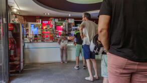 People Queue At Tobacco Shop For Cigarette Purchase. Spanish Estanco Store, Customer Line, Tobacco Sales, Retail Business, Consumer Behavior, Shopping