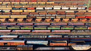 marshalling yard for railway cargo trains in Budapest. This is on Ferencvaros district. Aerial photo about lot empty and full trains.