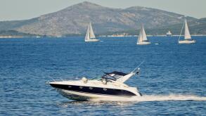 A power boat sailing across the Croatian islands, in the Adriatic Sea