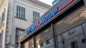 A view of Credit Mutuel Bank front store facade view with logo and signage