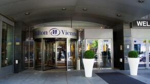 VIENNA, AUSTRIA - APR 30th, 2017: The logo above the main entrance of the Hilton Vienna Hotel in Wien, five star Hotel Hilton near the green City Park Stadtpark