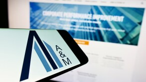 Stuttgart, Germany - 06-19-2022: Cellphone with logo of American consulting company Alvarez and Marsal LLC on screen in front of website. Focus on center-right of phone display.