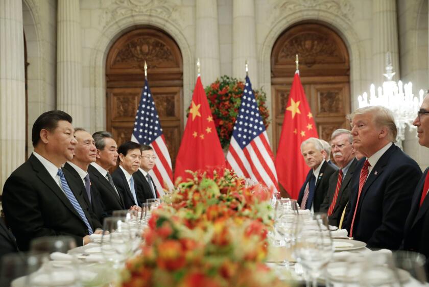 President Donald Trump, right, with China's President Xi Jinping, left, during their bilateral meeting at the G20 Summit, Saturday, Dec. 1, 2018 in Buenos Aires, Argentina. (AP Photo/Pablo Martinez Monsivais)