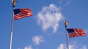 USA Washington DC George Washington Monument Two American Flags Flying on Flagpoles