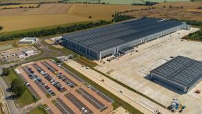 Aerial view of the Tritax Symmetry development at Symmetry Park, Biggleswade for the new portal framed regional distribution centre of the Co-op food group.
This steel-framed building covers 661,000 sq ft, 357 metres long, 144 metres wide, there are is al