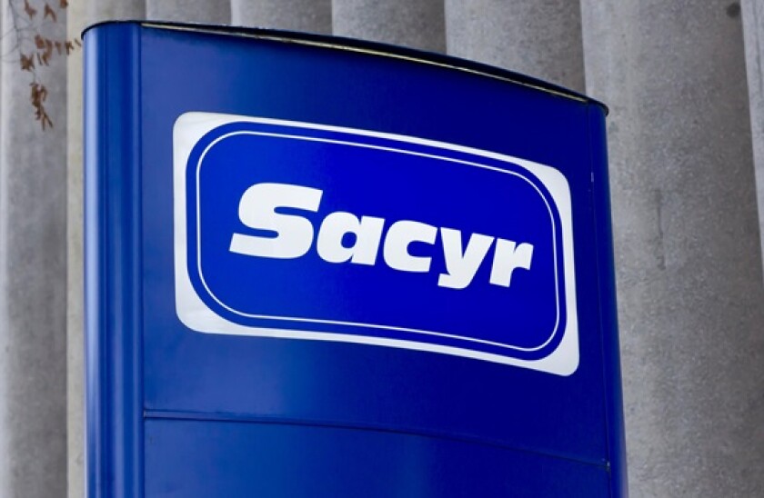 Sacyr construction company logo at headquarters in Madrid (Spain).