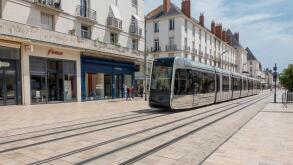 Tours, France sleek tram catenary-free, using underground power in city center. Alstom Citadis 402 cars light rail service began 2013