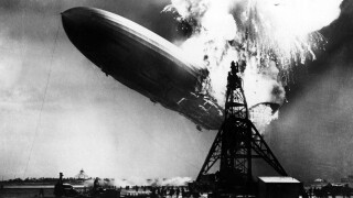 HINDENBURG bursting into flames at the mooring mast at Lakehurst, N.J.. Courtesy: CSU Archives / Everett Collection