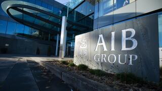 Dublin, Ireland. 03rd Dec, 2018. The lettering of the Irish commercial bank AIB (Allied Irish Banks) can be seen next to the entrance to the bank's head office. Credit: Christian Charisius/dpa/Alamy Live News